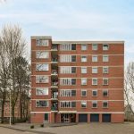 How to Make Money in Real Estate Passively a multi storey brick building 2022 04 05 04 19 33 utc.jpg